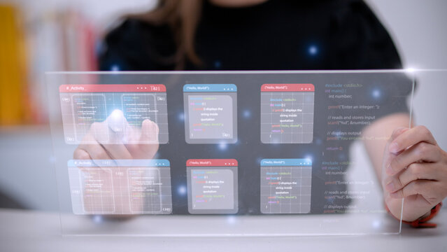 Digital technology, software development concept. Coding programmer, software engineer working on laptop with circuit board and javascript on virtual screen, internet of things IoT