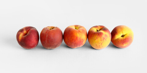 Many sweet peaches on white background
