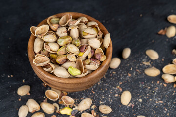 a large number of salty and crispy pistachios close-up