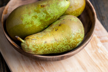 Ripe green pears on the table