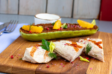 Grilled chicken breast with vegetables. Home made food. Concept for a tasty and healthy meal. Wooden background. Close up.