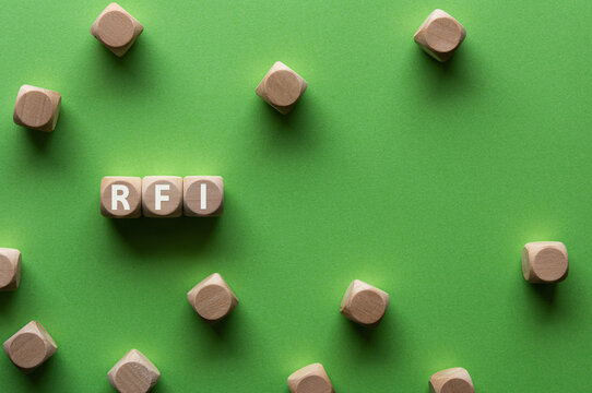 There is wood cube with the word RFI. It is an abbreviation for Request For Information as eye-catching image.
