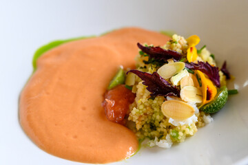 Exquisite dish of modern French haute cuisine prepared with fresh organic ingredients from restaurant own garden and farm and beautifully served