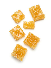 Many sweet honeycombs on white background