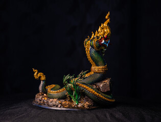 King of naga, naka Thailand dragon or serpent king in the dark - obrazy, fototapety, plakaty