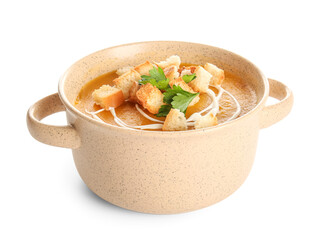 Pot of delicious pumpkin cream soup with parsley and croutons on white background