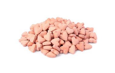Many heart shaped vitamins for pets isolated on white