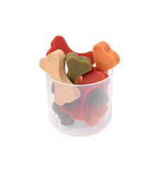 Bone shaped vitamins for pets in plastic container isolated on white
