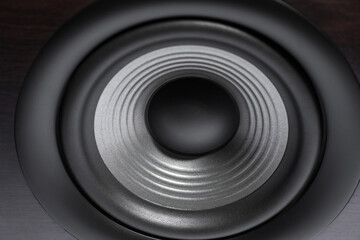 One wooden sound speaker as background, closeup