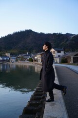 Fototapeta premium man looking at the sea