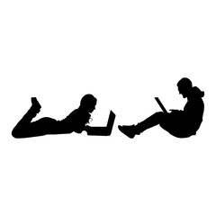 Silhouettes of men and women playing on laptops