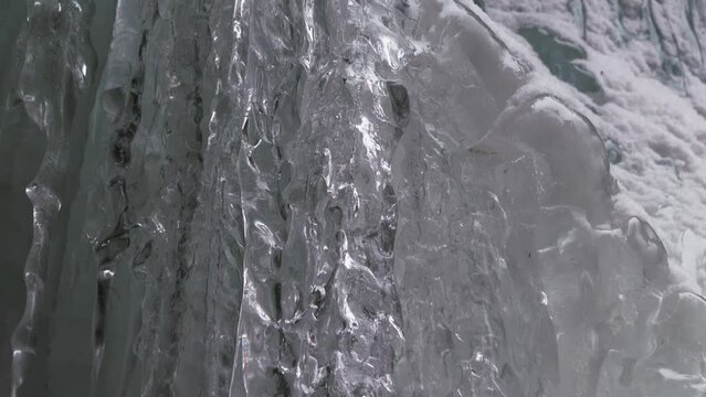 Snow covered frozen waterfall in Ausable Chasm, Adirondacks, Tilting View