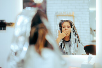 Yawning Sleepy Woman Waiting with Tin Foil in Hair Salon. Funny hairdresser customer feeling tired...