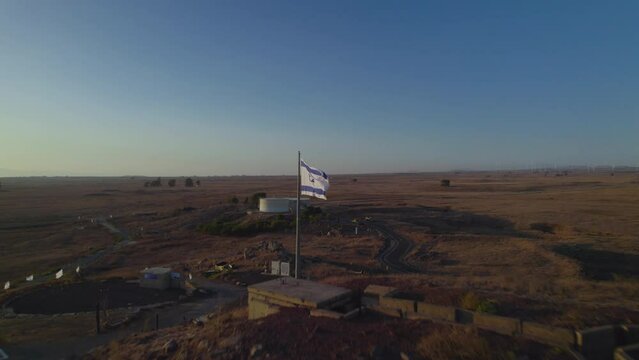 The flag symbolizing Israel's war is in the Golan Heights on the Tel Saki bunker that was used in the war, the site of one of the most critical battles of the Yom Kippur War on 1973
