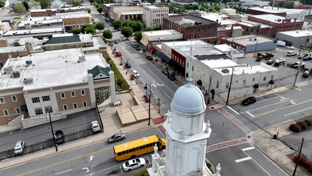 aerial push past cross above first baptist church in lenoir nc, north carolina
