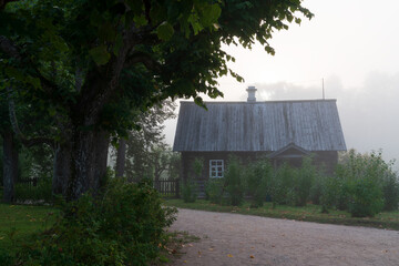 View of an old wooden hut on the territory of the Mikhailovskoye estate of the Pushkin...