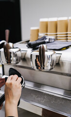 Barista Operating Espresso Machine