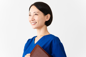 Obraz premium スクラブを着ている若い女性 医療イメージ 