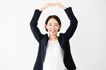 ビジネススーツを着ている若い女性　ビジネスイメージ