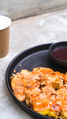 Crispy Banana Fritter Delight with Cheese, Almond Topping, and Strawberry Jam Dip