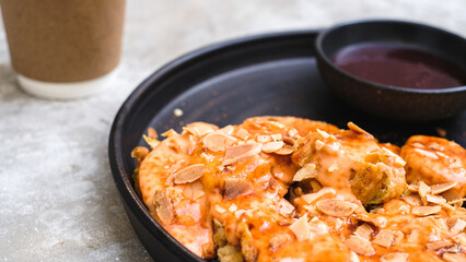 Crispy Banana Fritter Delight with Cheese, Almond Topping, and Strawberry Jam Dip