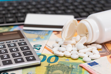 Ordering Medicines. Expensive Medicine and Inflation Concept: Pills and Capsules on the Euro Banknotes. Global Pharmaceutical Industry and Big Pharma. Trade in Medicines