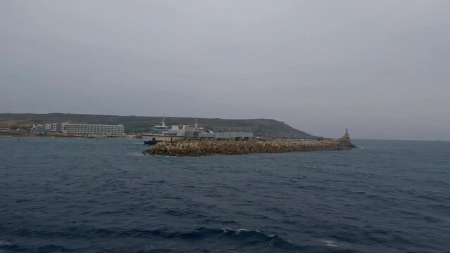 Boat Trip Along the Maltese Coastal Waters of Marfa Bay, Malta. Slow Motion.