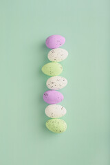 Fototapeta na wymiar Easter eggs dotted on a blue background