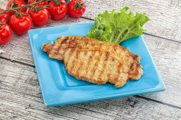 Grilled pork steak with ketchup