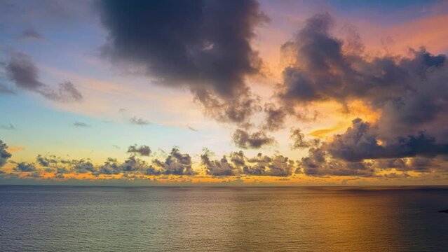 aerial hyperlapse view stunning clouds float above the sea as the sun sets..scenery The beauty of the sky was mesmerizing in stunning sunset.Gradient color..Sky texture, abstract nature background..