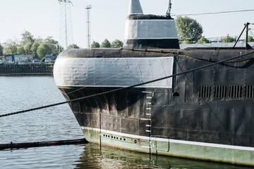 Close-up of a moored military submarine