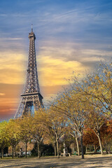 Fototapeta na wymiar Paris, the Eiffel Tower in autumn, with sunset sky
