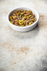 pistachios peeled without shell delicious nut eating cooking appetizer meal food snack on the table copy space food background rustic top view keto or paleo diet vegetarian vegan food
