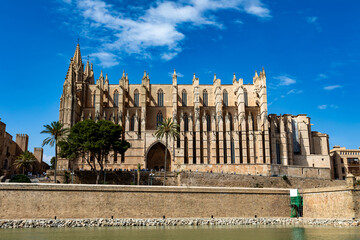 Gothic medieval cathedral La Seu and Royal Palace of La Almudaina. Capital city Palma de Mallorca. Balearic Islands Spain. Travel agency vacation concept. © ArtushFoto