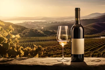 Fotobehang Wine bottle mock up, empty label, glass, product promotion, advertising, vineyards at sunset © IonelV