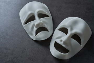 theatre theater theatrical tragedy drama comedy mask on grey background. theatre theater theatrical tragedy drama comedy mask. white happy and sad theatre theater theatrical tragedy drama comedy mask - obrazy, fototapety, plakaty