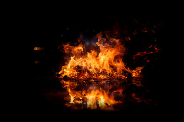 Red fire and sparks isolated on black background