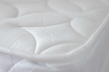 the white soft mattress background and texture. white new bed without dust mites. concept : allergy...