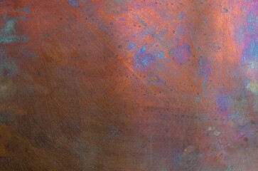 Copper background. Oxidation. Wall. Sunlight on the right. 
