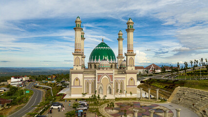 Fototapeta premium Top view of Arabic style mosque in Sumatra. Masjid Agung Syahrun Nur Tapanuli Selatan. Indonesia.