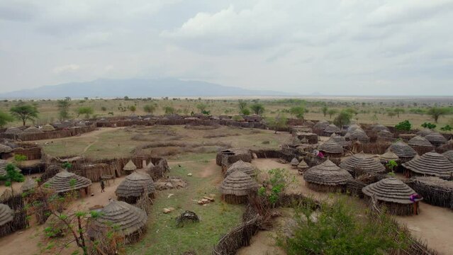 Panoramic aerial view of traditional tribal village with thatched roof of Ugandan Karamoja region in Uganda, Africa
