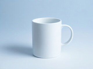 Obraz premium A plain white ceramic mug mock up on a plain blue background