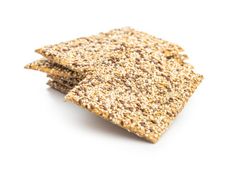 Knackebrot with sesame seeds. Wholegrain crispbread isolated on white background.
