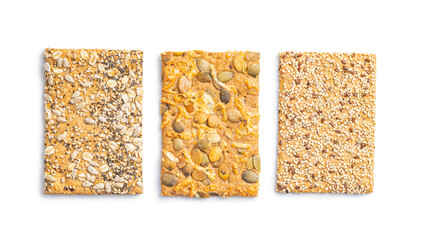 Knackebrot with sesame and pumpkin seeds. Wholegrain crispbread isolated on white background.