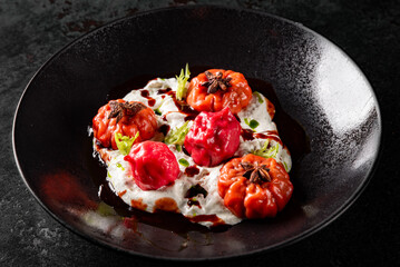 Halloween sweet dessert on black plate