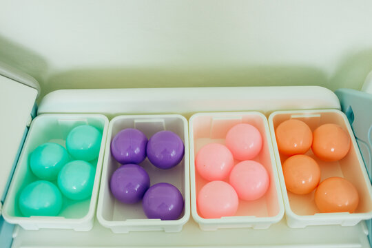Colorful easter eggs in plastic egg box. Selective focus.