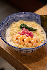 Appetizing japanese ramen noodle soup with shrimp
