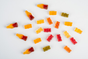 jelly bears candy and Cola flavored gummy jellies isolated on a white background. 