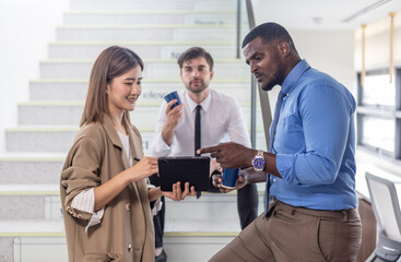 Multicultural colleagues celebrate project success with joyful, authentic conversation group selfie