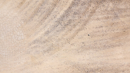Fototapeta na wymiar Perpendicular aerial view on rocky desert. Ideal for textures and patterns.